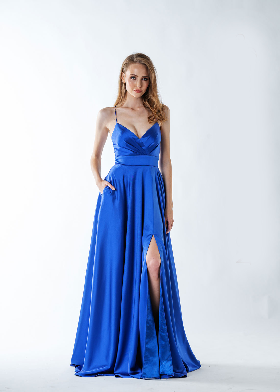 The truly elegant and flowng Madalina prom dress from MK Prom in Bletchley Milton Keynes in a fabulous sheer Royal blue satin fabric