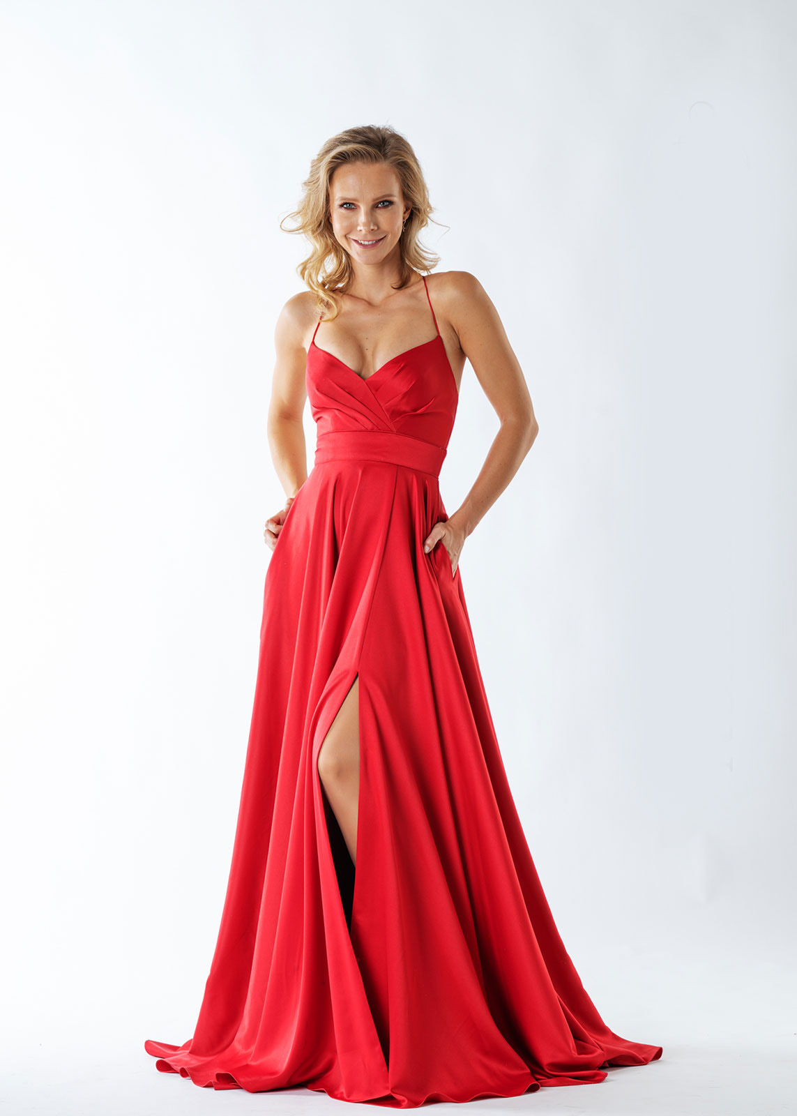 The truly elegant and flowng Madalina prom dress from MK Prom in Bletchley Milton Keynes in a fabulous sheer Vibrant Red satin fabric