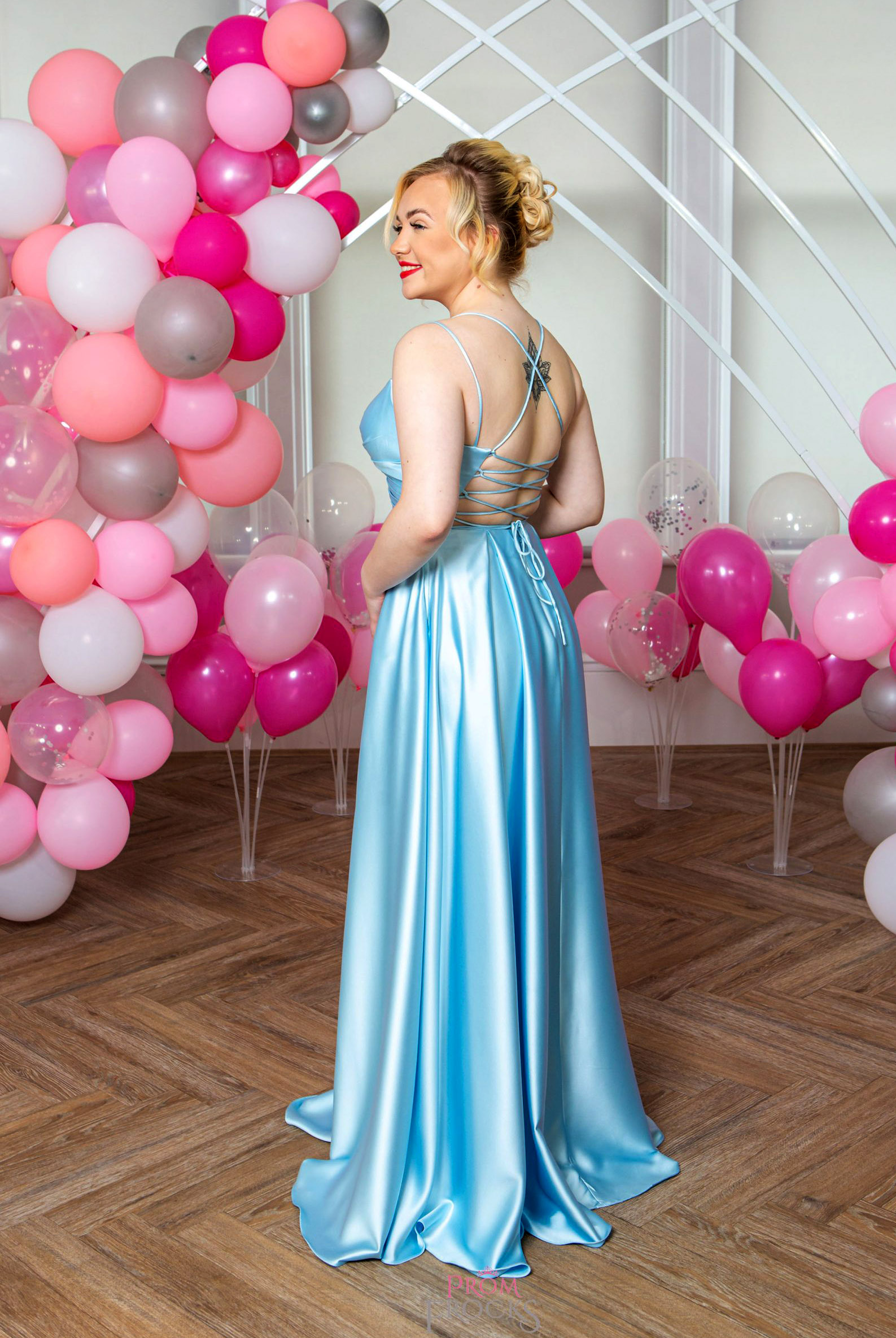One of MK Prom's finest prom dresses, the back detail on this delightful Janelle dress in shimmering Sky Blue!