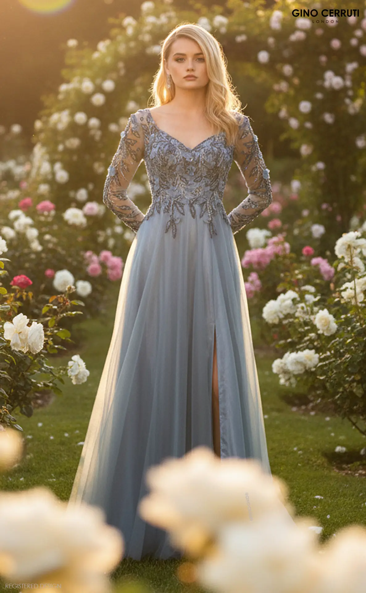 Isabelle by Gino Cerruti (Seamist) A-line silhouette with soft tulle overlay Full-length sheer sleeves with floral beading Illusion plunge neckline with structured bodice Flowing skirt with subtle leg split Exclusive to MK Prom Step into your very own fairytale with the Isabelle gown in seamist, a romantic and ethereal shade that captures the soft glow of a garden at dusk.