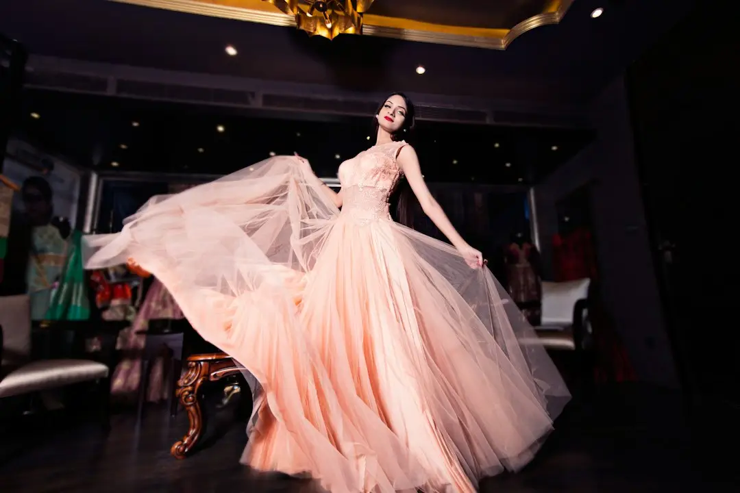 Model in an elegant evening dress, illustrating the Prom 2027 appointment season